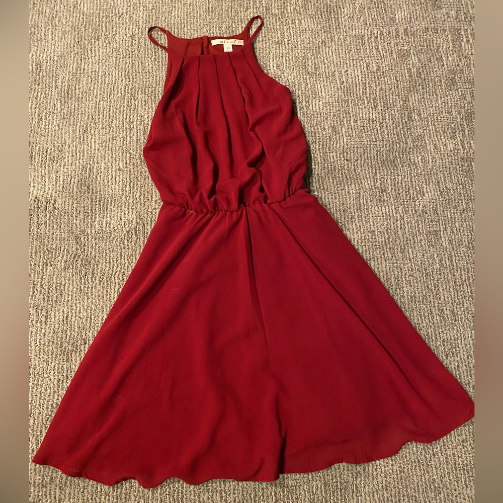 This is a xs maroon red dress that is super cute on!